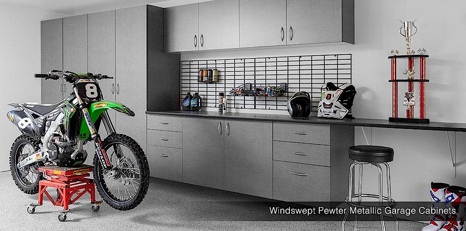Imitate this sleek look in your custom garage. Pewter metallic cabinets are sleek, beautiful and functional!