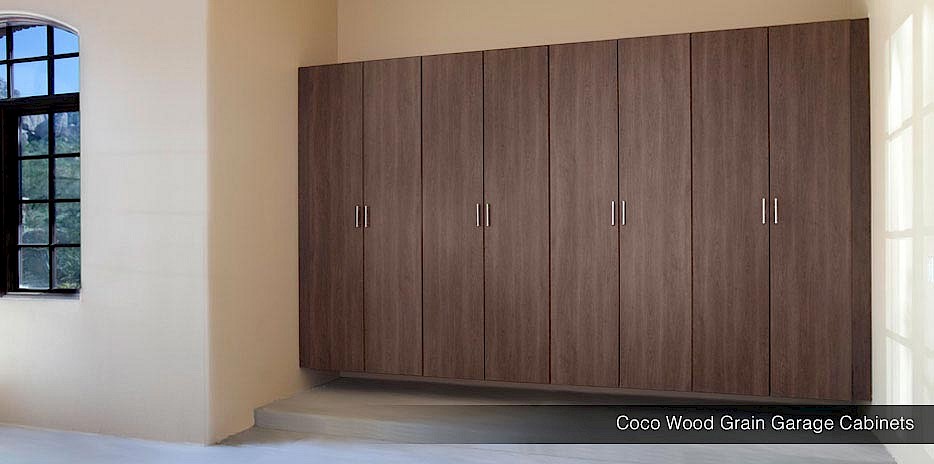 A dark wood grain offers a traditional style garage to blend with any home. A dark wood grain offers a traditional style garage to blend with any home.