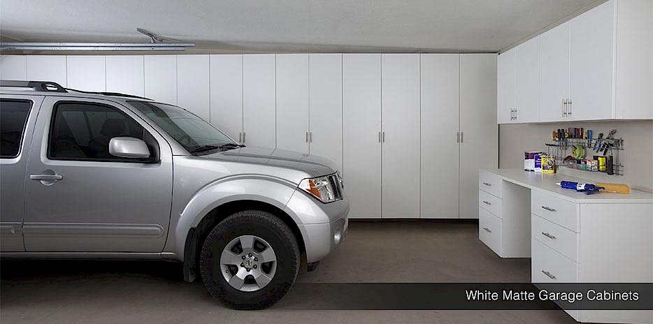 https://www.storagesolutions.ky/site/assets/files/1193/white-garage-cabinets-suv-grand-cayman.934x464.jpg